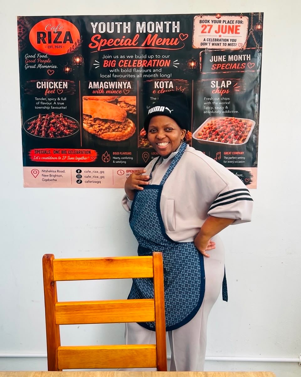 Chef Vuyokazi Duze standing inside Café Riza